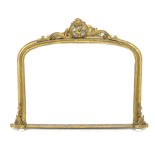 204 - A gilt over mantle mirror, with ornate composite decoration, a/f, 126 by 7 by 98cm high.