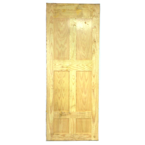 212 - A unopened plastic wrapped pine door, with six panels, 76.5 by 3.5 by 196cm high.