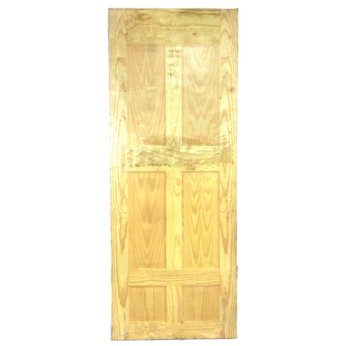 212 - A unopened plastic wrapped pine door, with six panels, 76.5 by 3.5 by 196cm high.