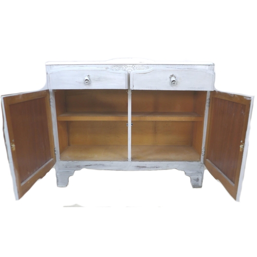 215 - A vintage white painted sideboard, with two drawers and two cupboards below, 108 by 41.5 by 92cm hig... 