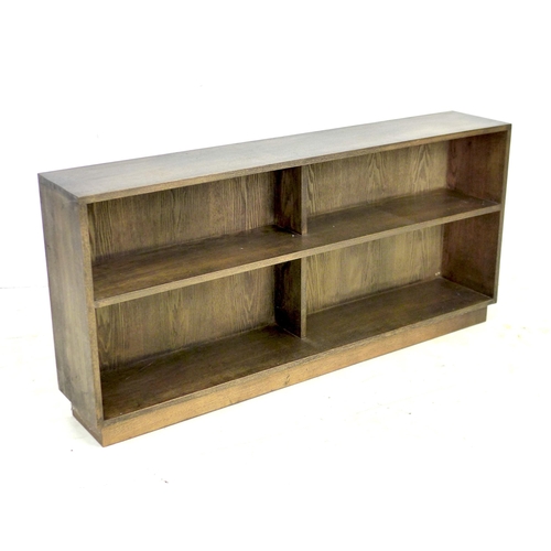 217 - A modern oak bookcase, closed back, six divisions with fixed shelves, 150.5 by 27 by 71.5cm high.