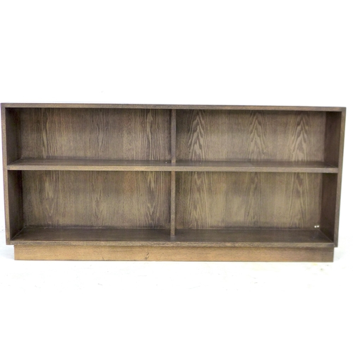 217 - A modern oak bookcase, closed back, six divisions with fixed shelves, 150.5 by 27 by 71.5cm high.