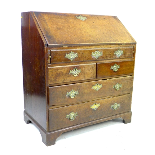 232 - A Georgian oak bureau, a/f poor condition, fall front with fitted interior, one long over two short ... 