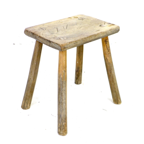 235 - An 18th century oak stool, the rectangular seat on outsplayed supports, the top 35.5 by 25cm, overal... 