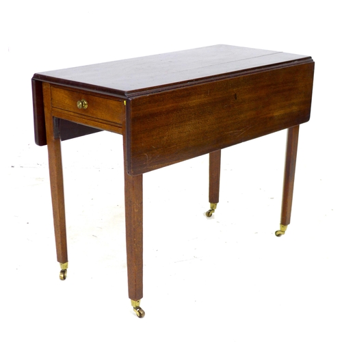 237 - A Regency mahogany Pembroke table, with two drawers and brass knobs, raised on tapered square sectio... 