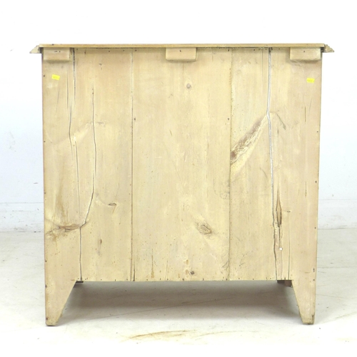 241 - An early 20th century pine chest of three drawers, raised on bracket feet with white ceramic handles... 