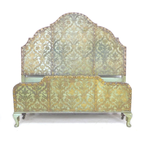 250 - A 20th century Continental bed head and footboard, with green and gilt leather effect work, brass st... 