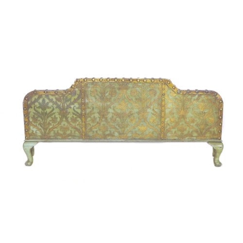 250 - A 20th century Continental bed head and footboard, with green and gilt leather effect work, brass st... 