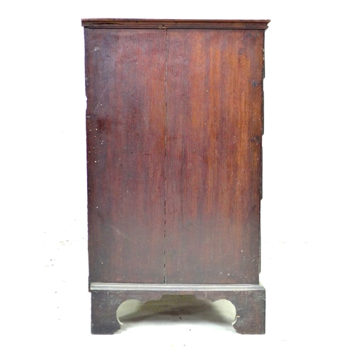 251 - A Georgian mahogany chest of drawers, two short over three long drawers, with brass swan neck handle... 