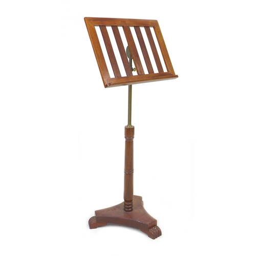 252 - A late 20th century mahogany music stand, with adjustable column, 43 by 43 by 117cm high.