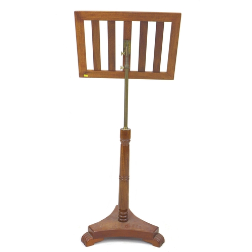 252 - A late 20th century mahogany music stand, with adjustable column, 43 by 43 by 117cm high.