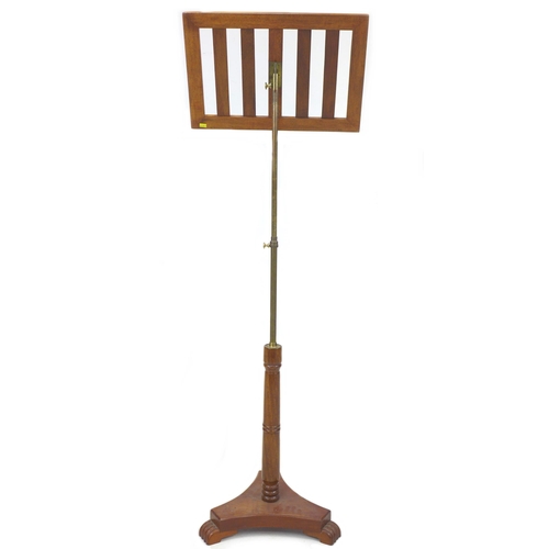 252 - A late 20th century mahogany music stand, with adjustable column, 43 by 43 by 117cm high.