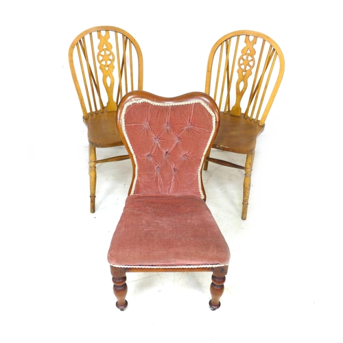 255 - A group of chairs, comprising a 19th century beech spindle back open armchair, a modern stained beec... 