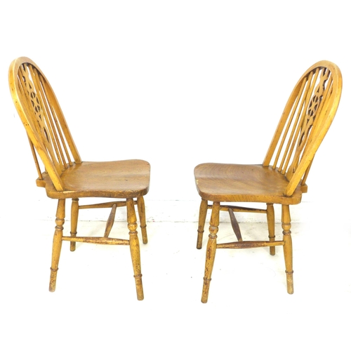 255 - A group of chairs, comprising a 19th century beech spindle back open armchair, a modern stained beec... 