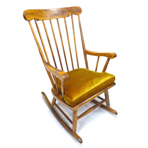 255 - A group of chairs, comprising a 19th century beech spindle back open armchair, a modern stained beec... 