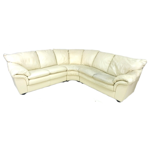 266 - A group of three modern white leather sofas, comprising a corner five seater, 470 by 85 by 88cm high... 