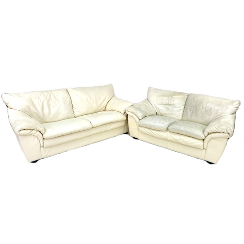 266 - A group of three modern white leather sofas, comprising a corner five seater, 470 by 85 by 88cm high... 