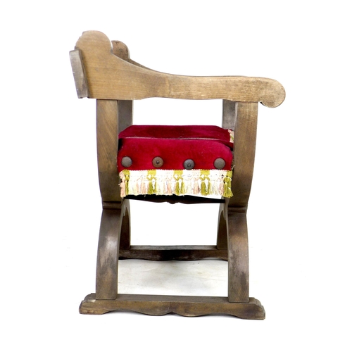 268 - A carved work curule open armchair with upholstered seat, 62 by 54 by 75cm high.