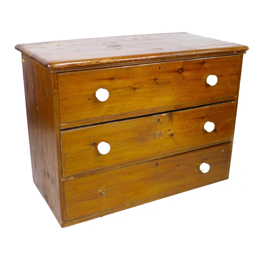 270 - A Victorian pine chest of three graduating drawers, with white ceramic handles, 107.5 by 56 by 79cm ... 