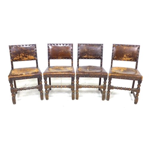 273 - A group of eight mid 20th century oak dining chairs, in Jacobean style, all with studded leather bac... 