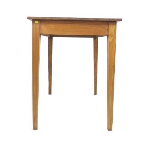 274 - Two 20th century tables, comprising a stained pitch pine side table, with memorial plaque to lower s... 