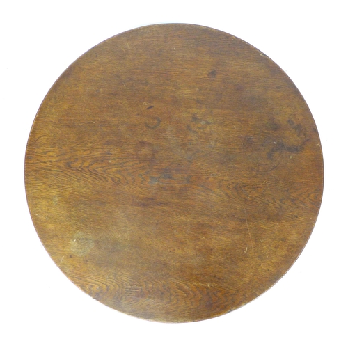 275 - A 20th century oak occasional table, with circular top raised on four pillars on block foot base, 10... 