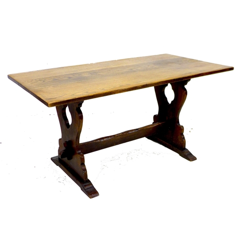 276 - A reproduction dining suite, comprising a 17th century style stained oak dining trestle table, 153 b... 