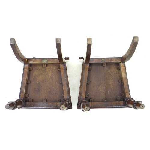 291 - A pair of Victorian oak hall chairs, with fielded panel backs, raised on lobe carved front legs and ... 