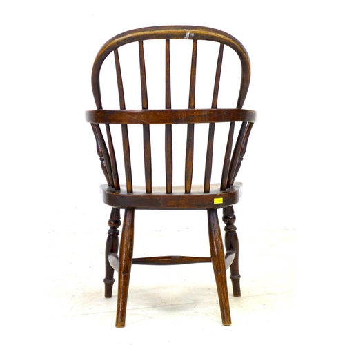 294 - A Victorian oak child's Windsor chair, with stick back and H stretcher, 40.5 by 48 by 63.5cm high.