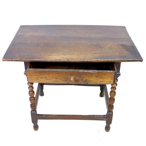 297 - A 17th century oak side table, the rectangular three plank surface with breadboard ends, above a sin... 