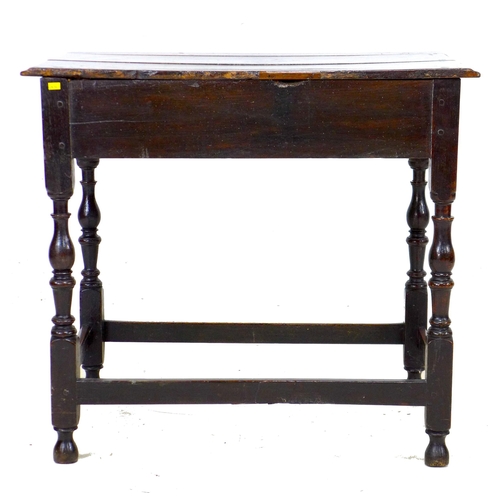 299 - A 17th century oak side table, the rectangular surface above a single frieze drawer with brass drop ... 