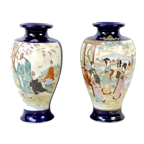 3 - A pair of Japanese porcelain vases, early 20th century, a/f drilled for use as lamp bases, decorated... 