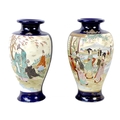 A pair of Japanese porcelain vases, early 20th century, a/f drilled for use as lamp bases, decorated... 