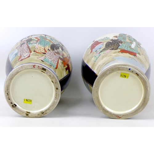 3 - A pair of Japanese porcelain vases, early 20th century, a/f drilled for use as lamp bases, decorated... 