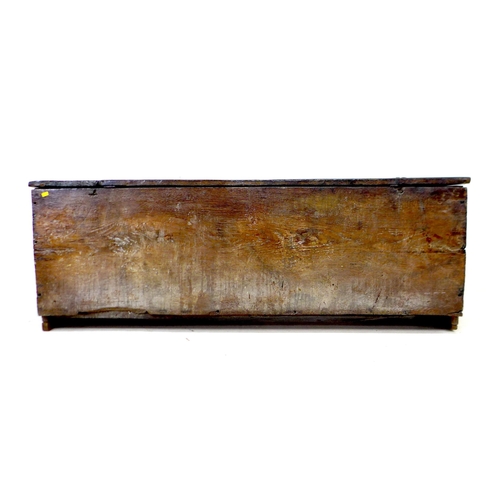 302 - A 17th century oak sword chest, line carved decoration, replaced hinges, sawn off feet, 142 by 42 by... 