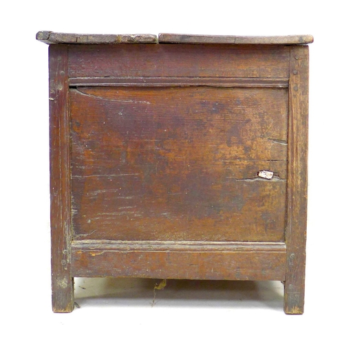 309 - An 18th century three panelled oak coffer, with lift lid, raised on straight legs, modern brass hing... 