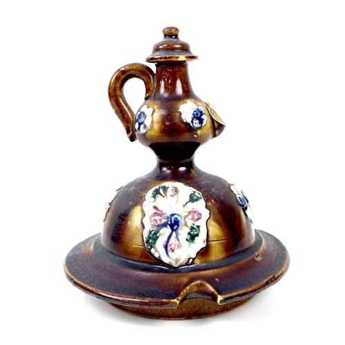 31 - A Victorian bargeware teapot, applied plaque inscribed 'A Present From A Friend', 36cm high, togethe... 