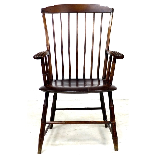 310 - An American 19th century 'Windsor' style open armchair, the high back with a stepped top rail suppor... 