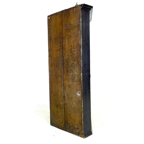 322 - A George III oak corner cupboard, with a single flat front fielded panel door, fixed shelves to inte... 