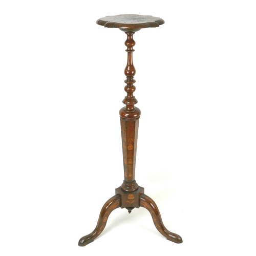 324 - A 19th century Dutch marquetry jardiniere stand, with a quatrefoil form top, turned column, tripod w... 