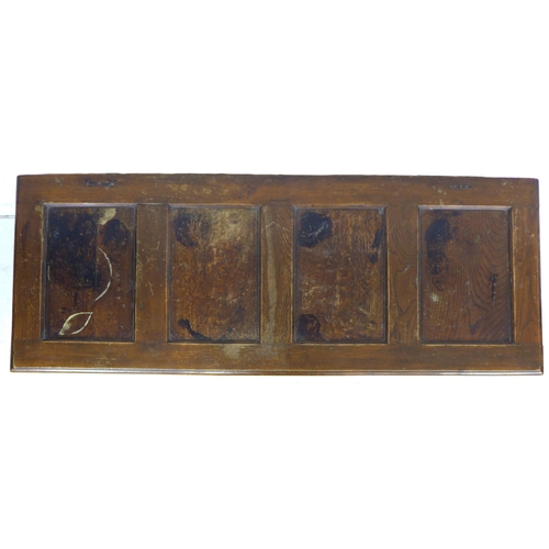 325 - An early 18th century oak coffer, with blind carved front, panelled sides, raised upon square sectio... 