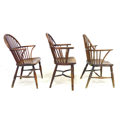 328 - A group of three 18th century low back Windsor armchairs, comprising a Georgian elm and yew Windsor ... 