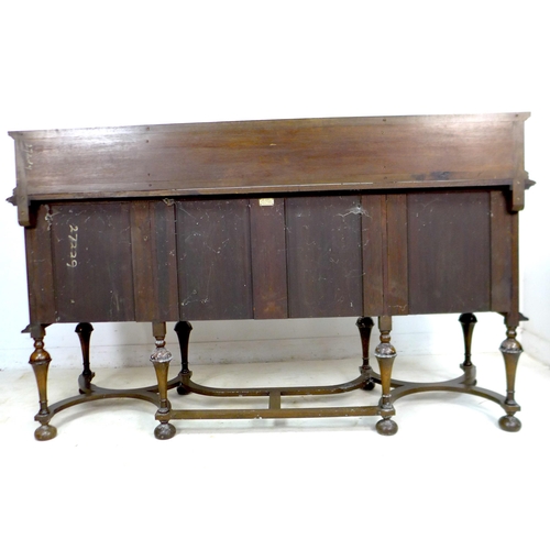 329 - An Edwardian oak sideboard, two central drawers flanked by two cupboards, brass drop handles, upstan... 