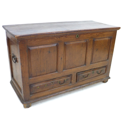 334 - An 18th century pine mule chest, with three carved panels to the front, over two drawers, raised on ... 