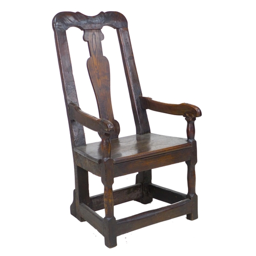 338 - A 17th century and later oak open armchair, the high back with vase shaped splat and shaped top rail... 