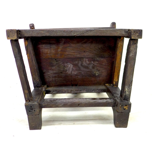 338 - A 17th century and later oak open armchair, the high back with vase shaped splat and shaped top rail... 