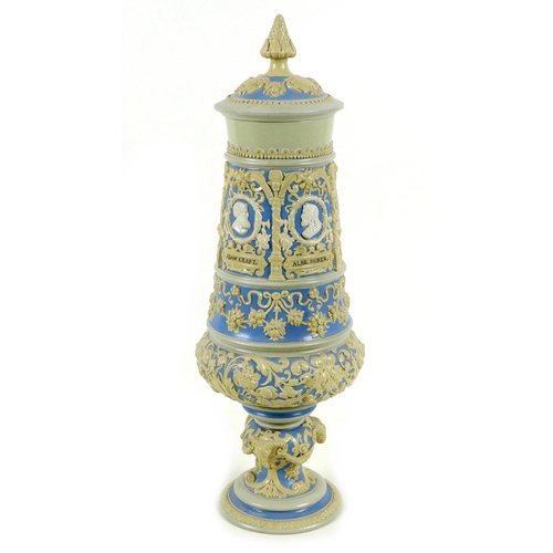 34 - A Villeroy & Boch Mettlach pottery exhibition style vase and cover, circa 1910, moulded in relief wi... 