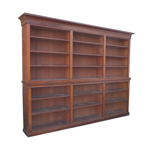 341 - A very large Edwardian mahogany bookcase, made up of six sections, each with four shelves, 280 by 38... 