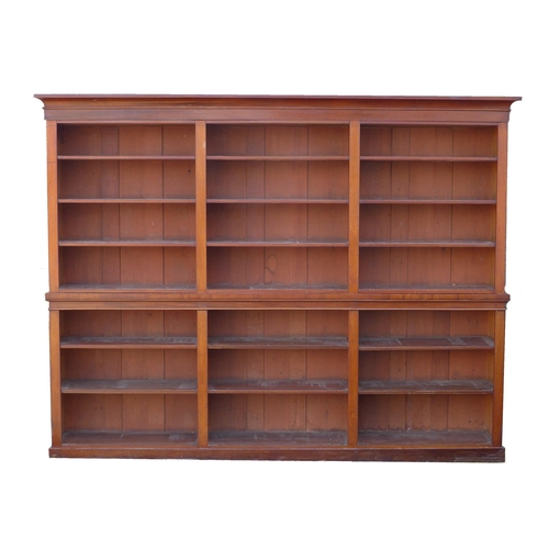 341 - A very large Edwardian mahogany bookcase, made up of six sections, each with four shelves, 280 by 38... 