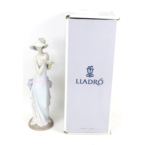 36 - A Lladro porcelain figure, 'Tea Time', 5470, 36.5cm high, in original box.